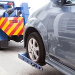 baja vehiculo recogida con grua