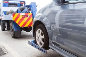 baja vehiculo recogida con grua